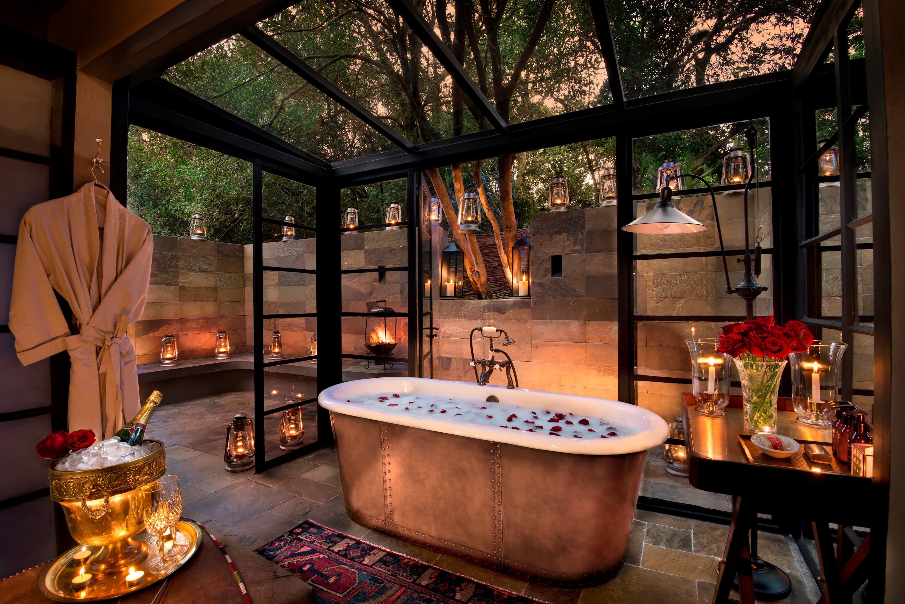 A slow hospitality moment built around a bath and a view